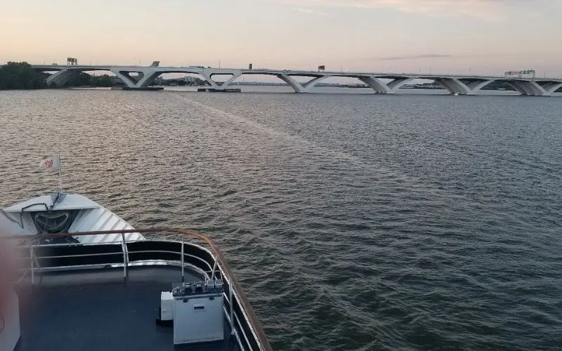 A City Experiences boat ride passes under a bridge on the Potomac River.