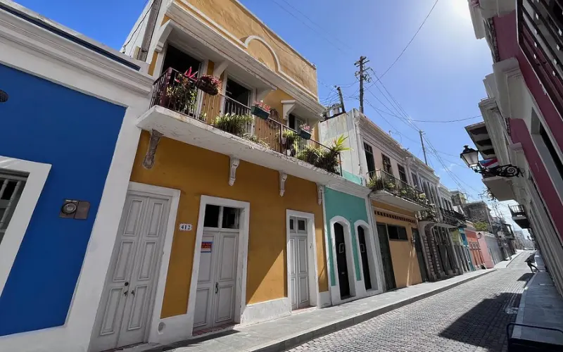 Colorful colonial buildings line a street in Old San Juan.