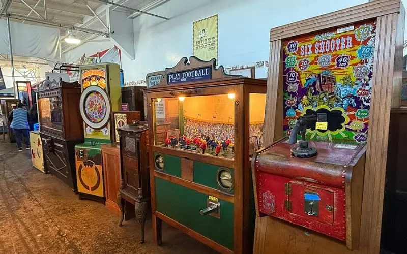 Rows of vintage arcade machines inside Musée Mécanique.
