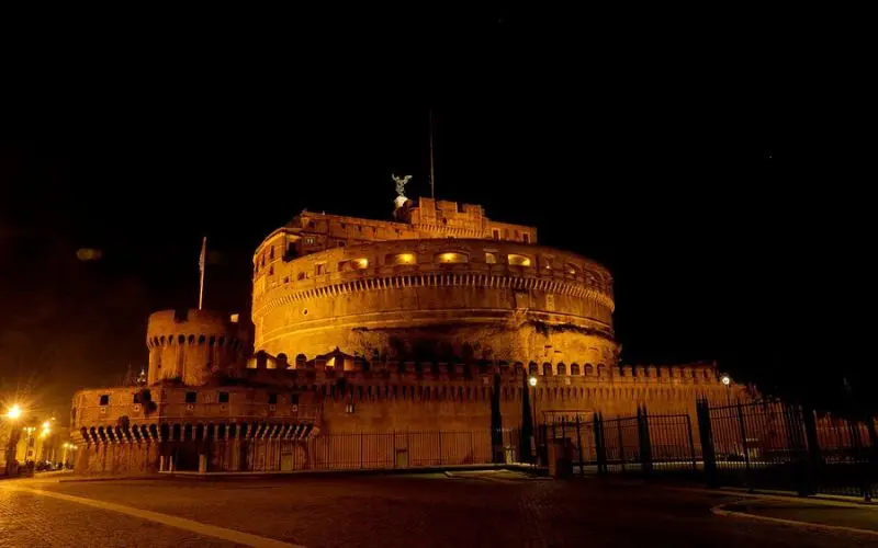 Castel Sant’Angelo in Rome, Italy illuminated at night.