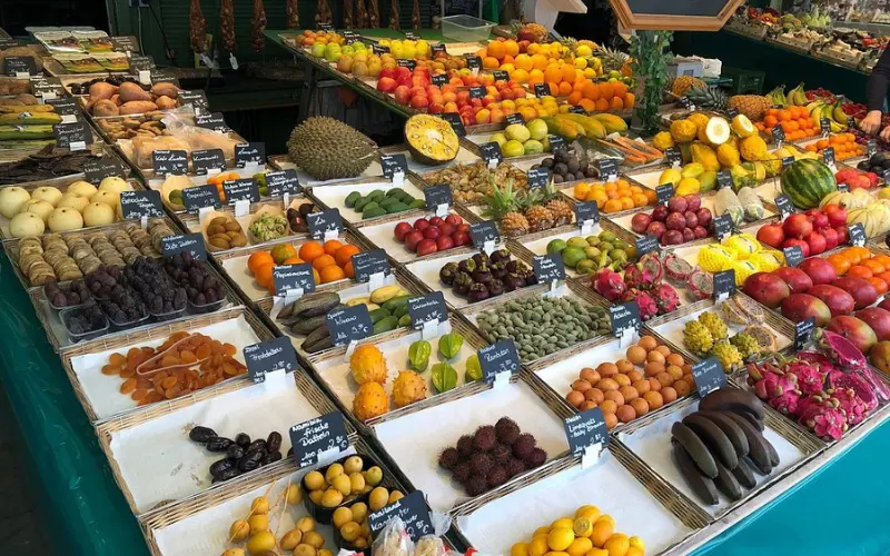 Colorful fruits and produce for sale at Viktualienmarkt in Munich.