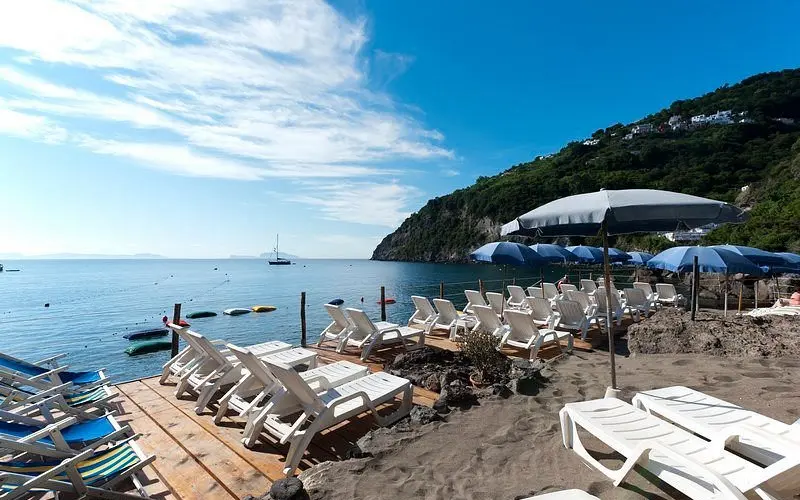 Sun loungers and umbrellas on Cartaromana Beach.