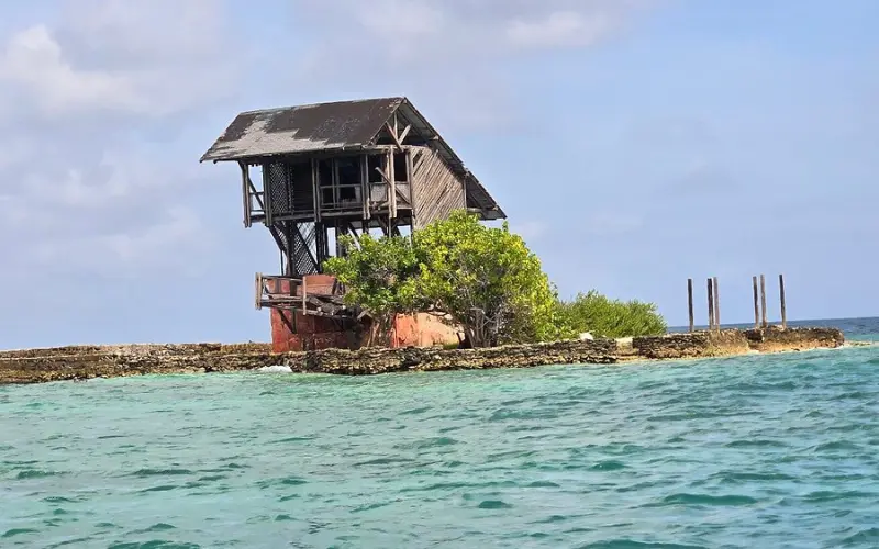 Wooden house on a small island in the Rosario Islands.