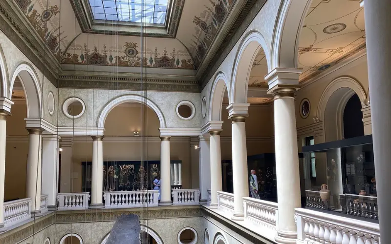 Arched interior with exhibits at the National Museum of Bosnia and Herzegovina.