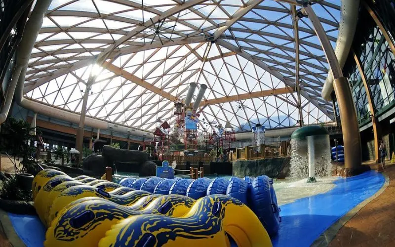 Indoor water park with slides and pools at Massanutten Resort.