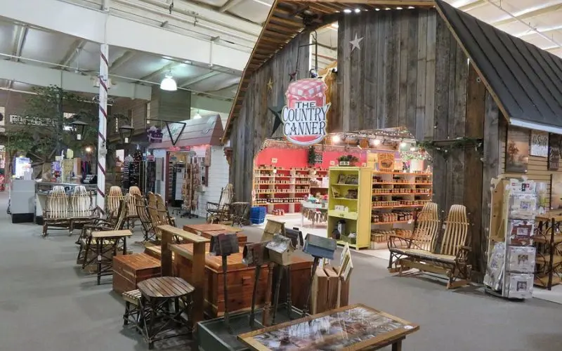 Shops and wooden furniture at the Shenandoah Heritage Market.