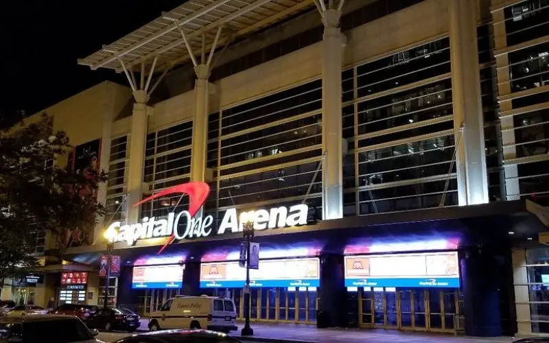 The Capital One Arena lit up at night in Washington, DC.