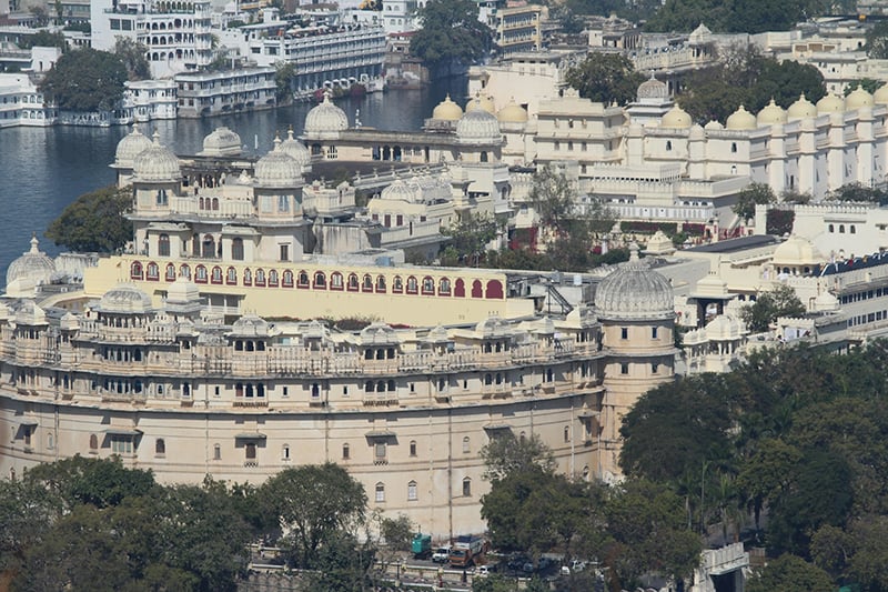 City Palace in Udaipur: A regal masterpiece blending history and opulence beside the serene lakeside beauty.