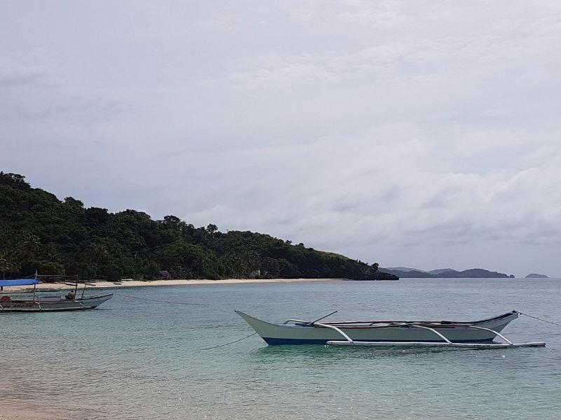 Discover the pristine beauty of Cobrador Island, where turquoise waters meet untouched shores
