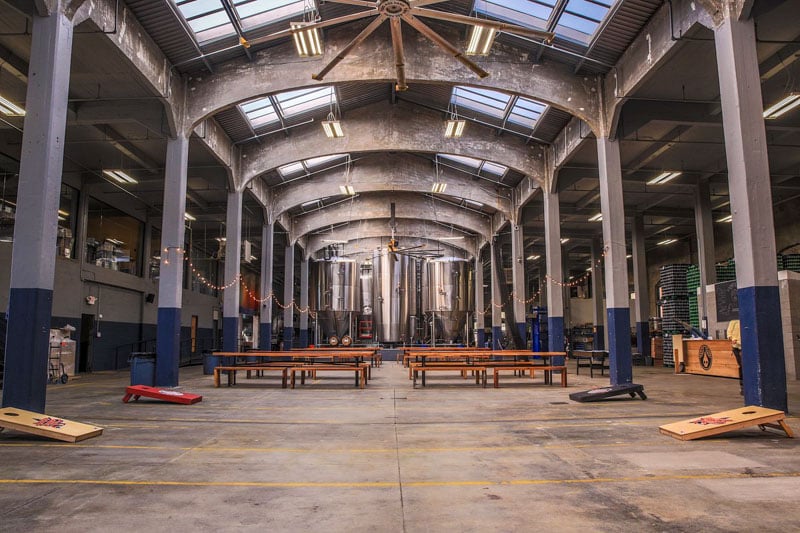 Rhinegeist Brewery offers a blend of history and modern craft in the Brewery District.