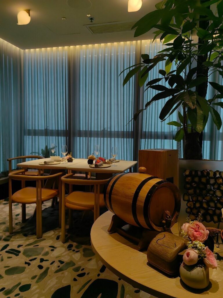 Elegant dining setup at MONO with minimalist decor, soft lighting, and a cozy atmosphere.