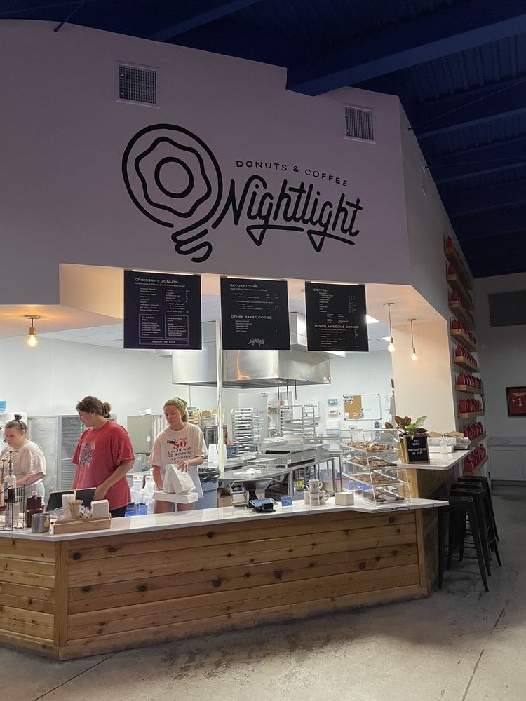 Modern counter and kitchen at Nightlight Donuts & Coffee.