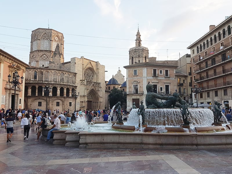 Plaza de la Virgen: Timeless elegance where fountains whisper tales amid historic beauty.