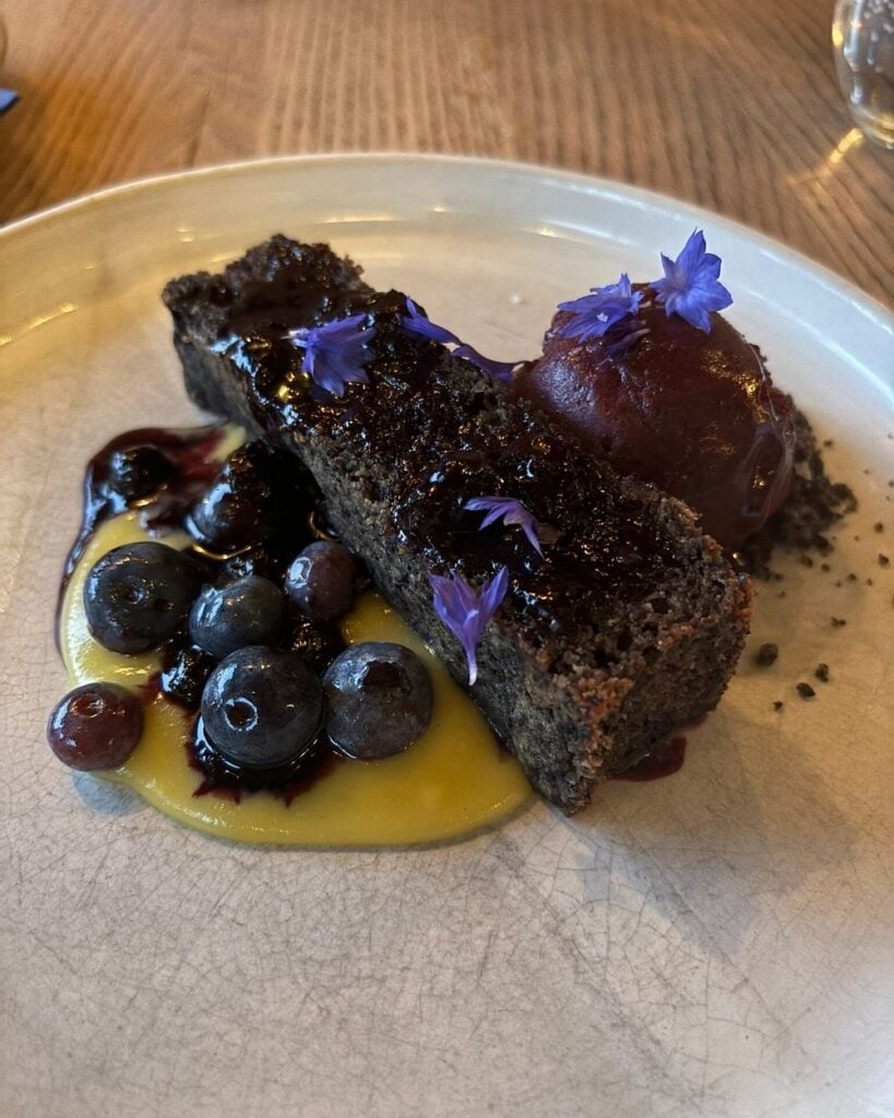 Artistic dessert with blueberries and sorbet at The Acorn.