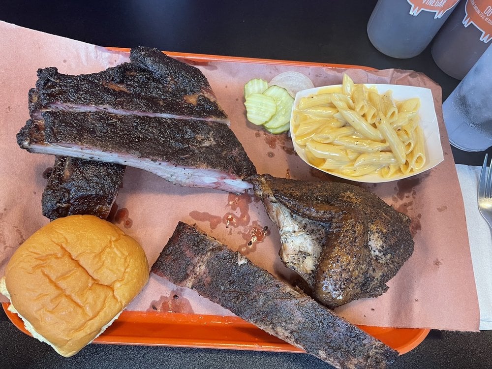 BBQ tray from The Bearded Pig with ribs, chicken, mac and cheese, and a bun.