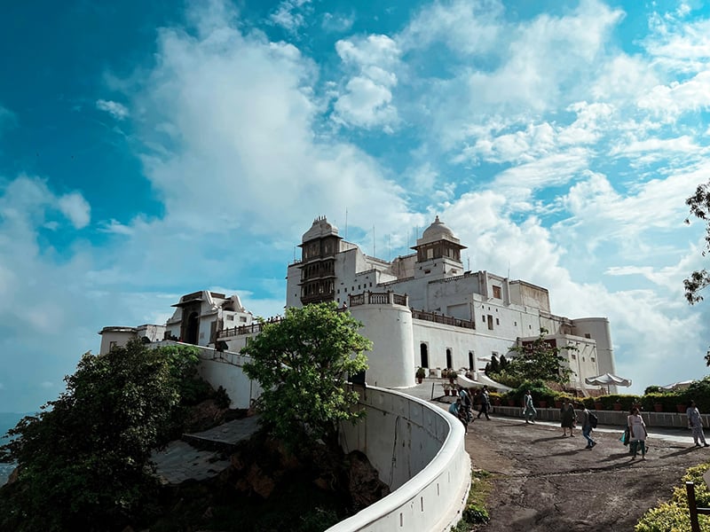 The Monsoon Palace: Hilltop oasis where history's vistas meet the breathtaking allure of surrounding lakes.