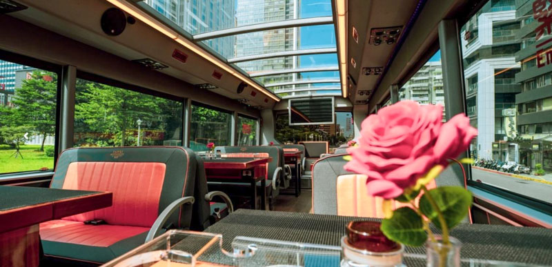 The Restaurant Bus offers a mobile and luxurious dining experience on a double-decker bus that roams the city's streets.