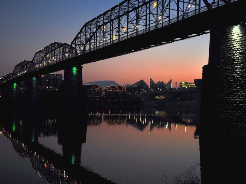 The Walnut Street Bridge, among the world's longest pedestrian bridges, transforms into something special as the sun sets