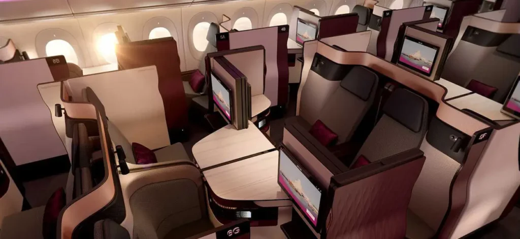 Qatar Airways Qsuite cabin layout showing alternating forward and rear-facing business class seats