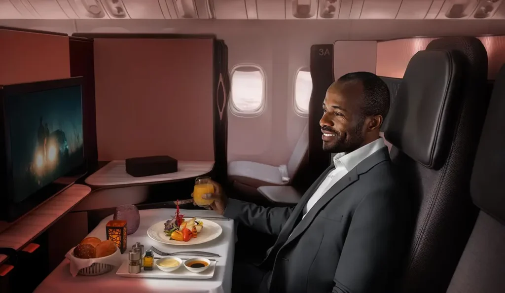 Qatar Airways business class premium inflight dining and entertainment