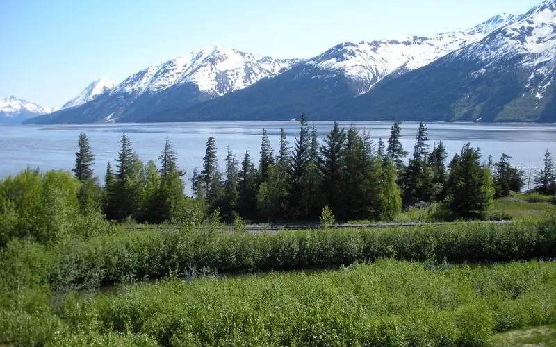Scenic view of snow-capped mountains and water in Anchorage.