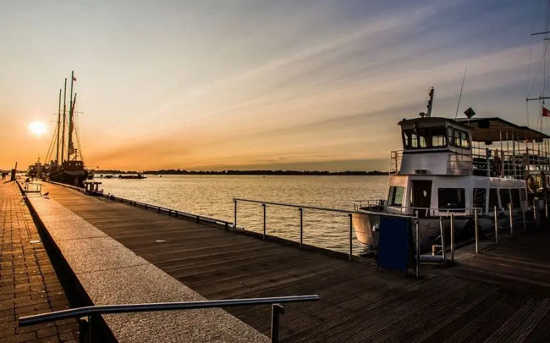 Boats docked along the boardwalk at Harbourfront Centre in Toronto.