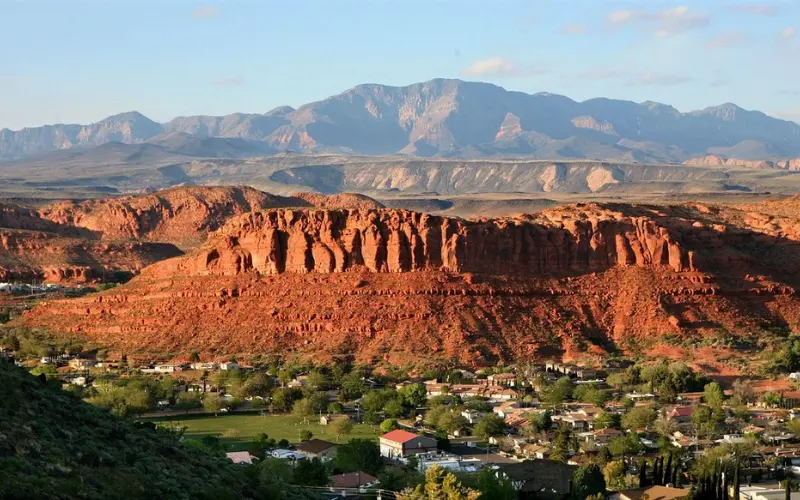 St. George Utah red rock cliffs and desert city landscape.