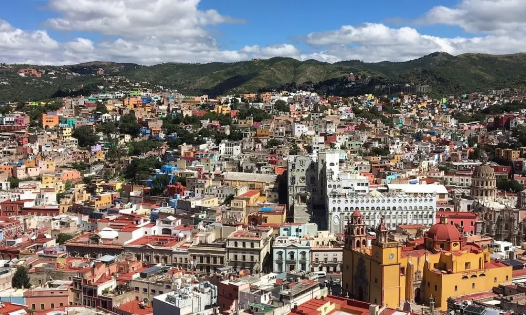 Colorful hillside buildings and cityscape in Guanajuato.