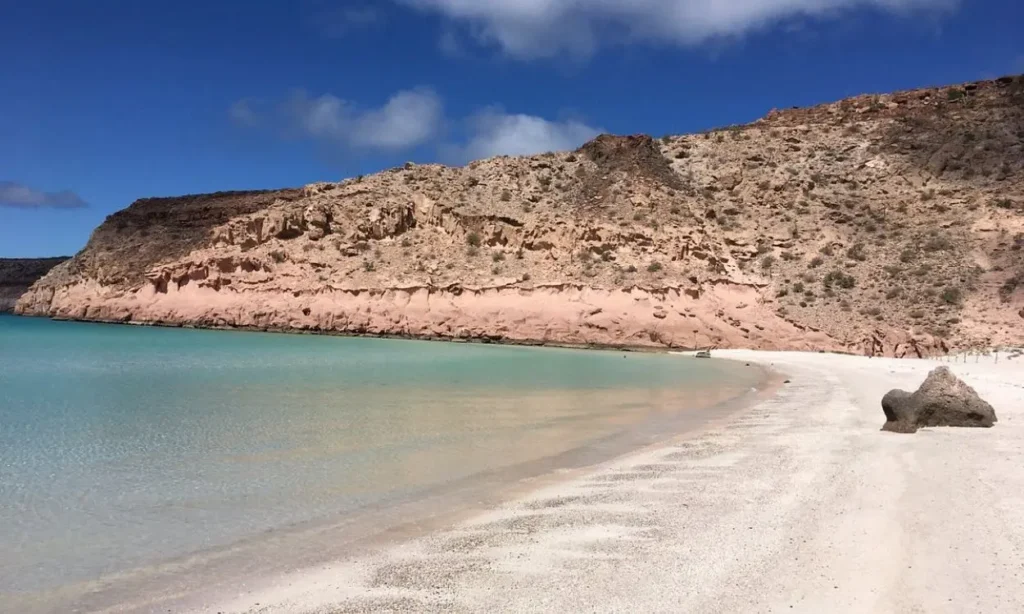 Tranquil beach and rocky cliffs at Los Cabos.