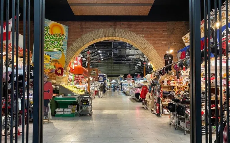 Inside view of stalls and shops at St. Lawrence Market in Toronto.