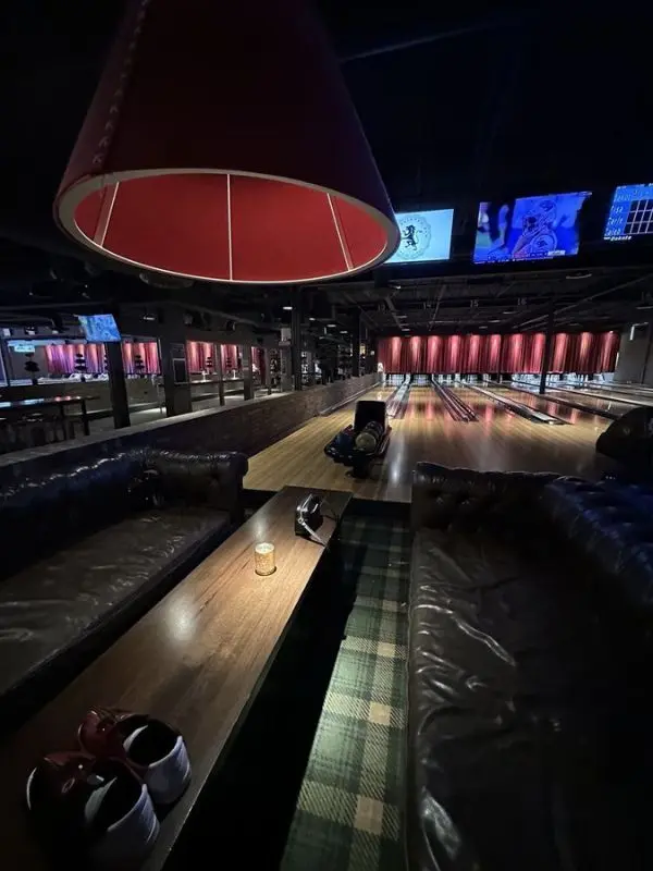 Bowling lanes and lounge seating at The Painted Pin.