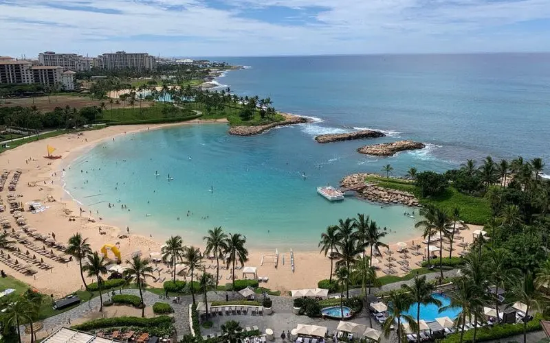 A crescent-shaped beach and resort area in Kapolei.