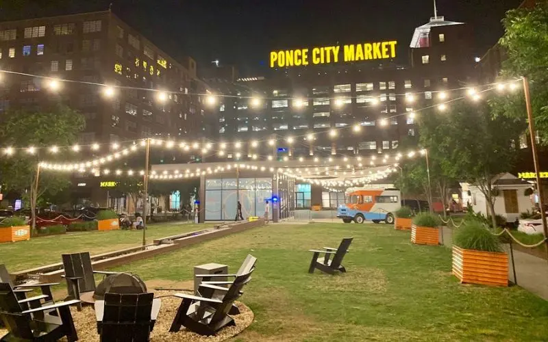 Outdoor seating and string lights at Ponce City Market.