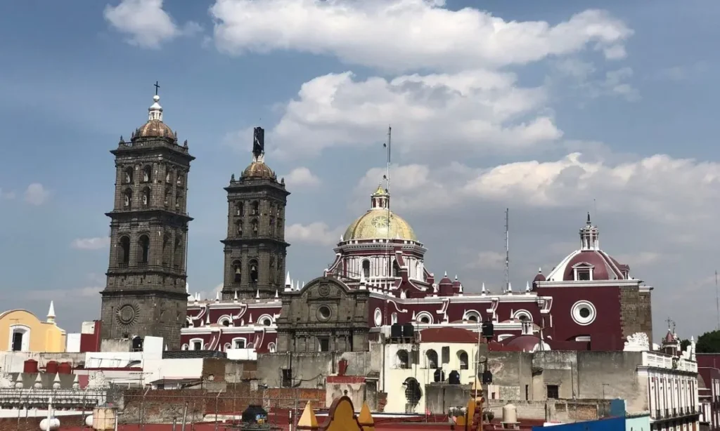 Historic cathedral with towers and dome in Puebla.