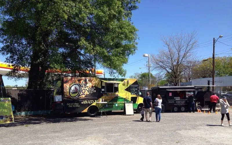 Food trucks and people gathered at Atlanta Food Truck Park.