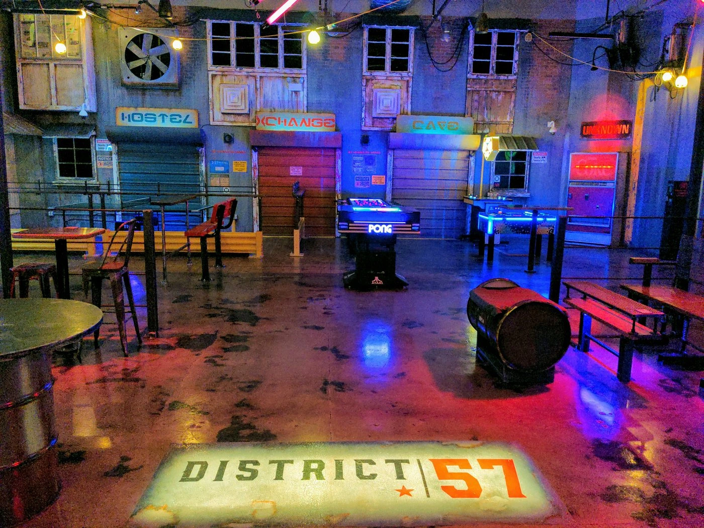 A visit to District 57 is one of the best things to do in Charlotte at night, with neon lighting and gaming stations.