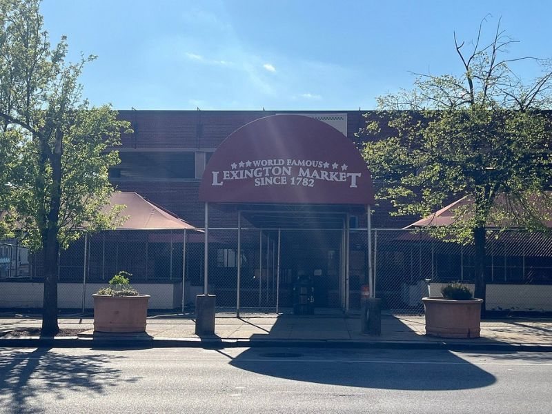 Experience the authentic Baltimore vibe at Lexington Market with live music, artisan encounters, and a vibrant atmosphere.