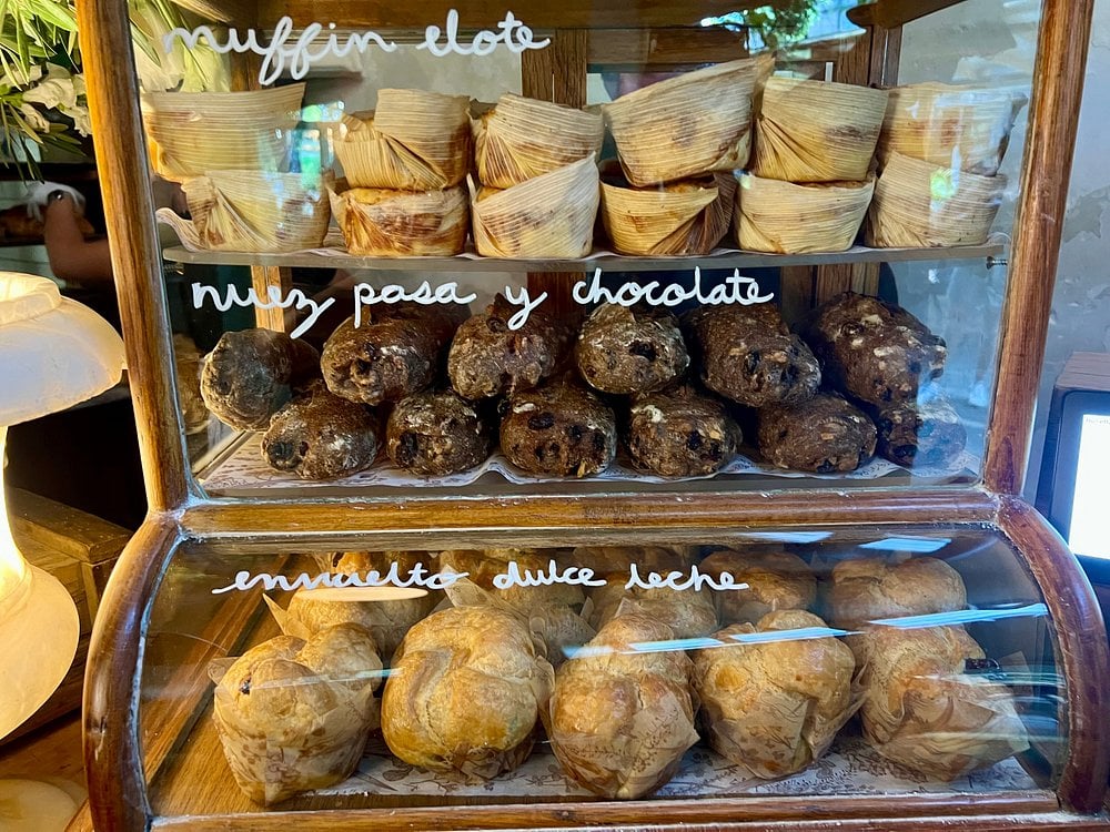 Baked goods like muffins and pastries on display at Panadería Rosetta.