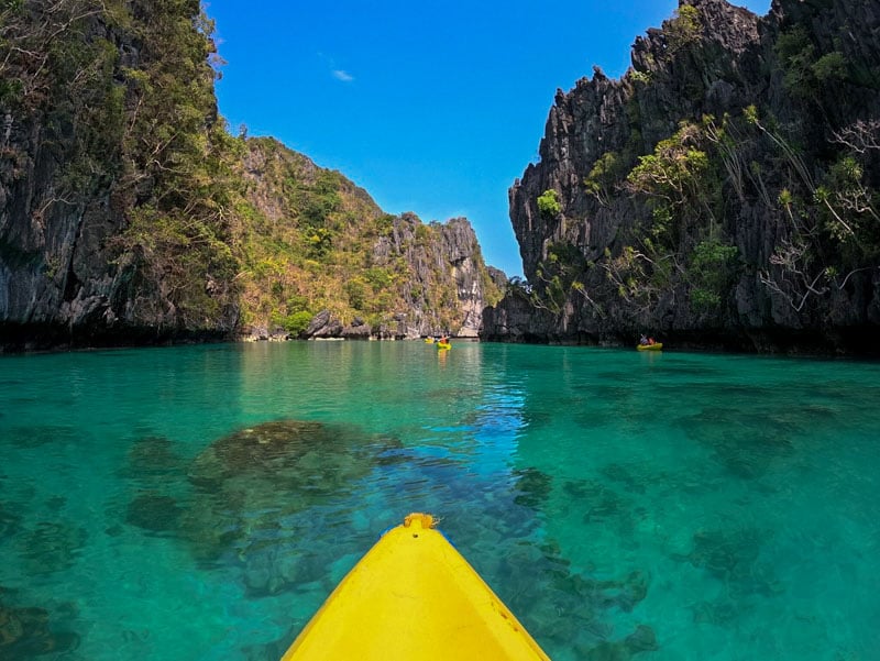 Kayaking in El Nido's Small and Big Lagoons offers a serene experience amid stunning limestone cliffs and picturesque waters.