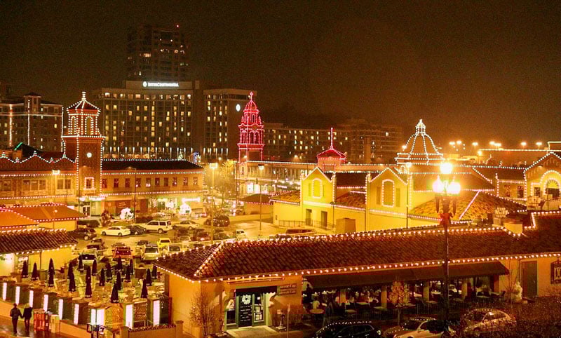 Country Club Plaza shines at night with stunning Spanish-style architecture, offering a relaxed, upscale experience.