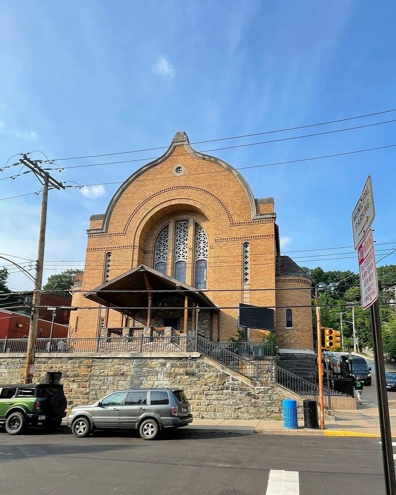 Street view of Mr. Smalls Theatre, a historic brick building with arched windows.