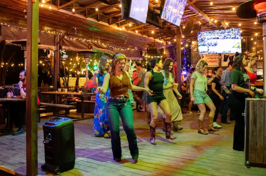 Learn to line dance at a classic outdoor saloon