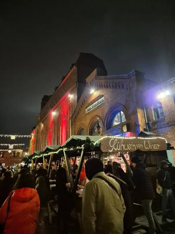 A Christmas market fills the courtyard of the KulturBrauerei in Berlin.