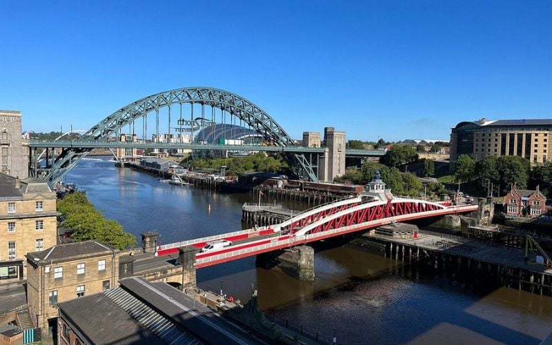 The Tyne Bridge and Swing Bridge spanning the river in Newcastle.