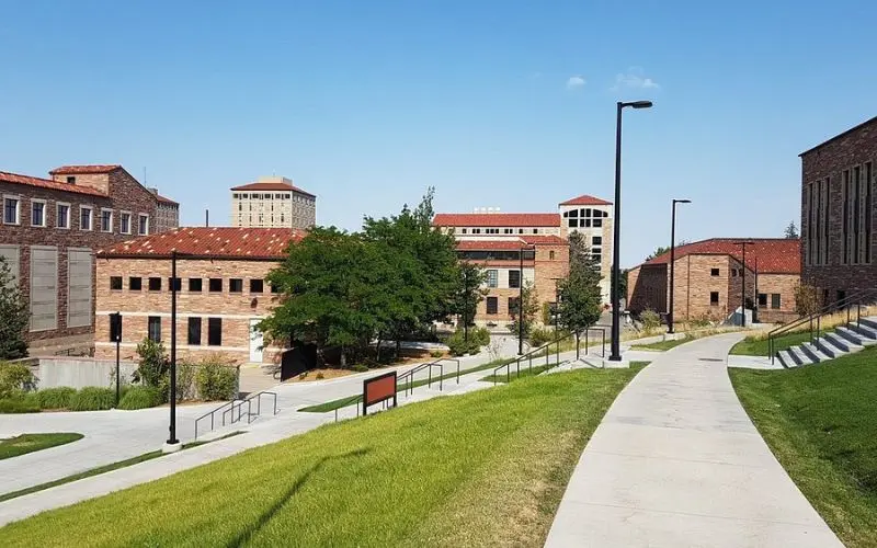 The University of Colorado Boulder campus features stone buildings and walkways.