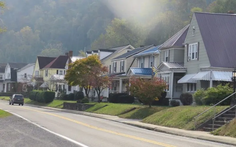 A row of houses lines the road in Winfield.
