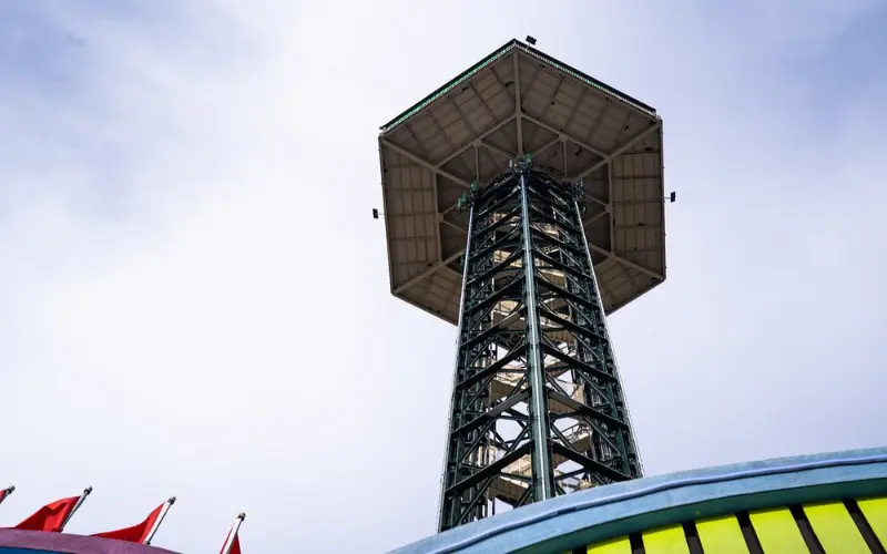 Gatlinburg Space Needle is a tall observation tower viewed from below.