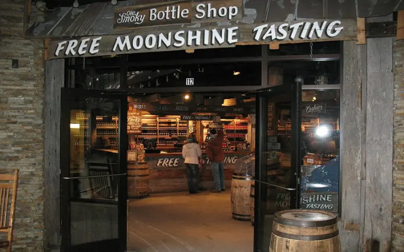 Ole Smoky Moonshine Distillery has a rustic shop entrance offering free moonshine tastings.