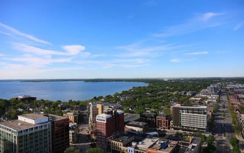 Aerial view of Madison with Lake Monona beside the city.