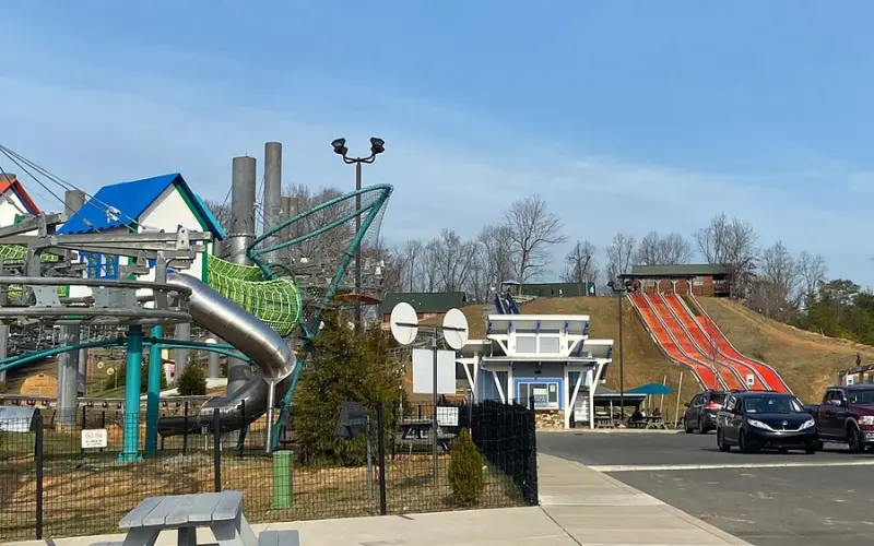Rowdy Bear Mountain shows outdoor adventure rides with slides and climbing attractions.